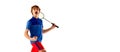 Portrait of teen boy in uniform, badminton player after successful game isolated over white background. Winning emotions Royalty Free Stock Photo