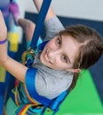 Portrait of teen girl on the climbing wall Royalty Free Stock Photo