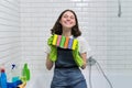 Portrait of teen girl doing cleaning in bathroom Royalty Free Stock Photo