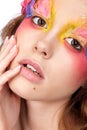 Female with hand near face and fashion feather eyelashes make-up Royalty Free Stock Photo