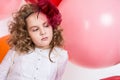 Portrait of teen girl in a hat and white dress on a background o Royalty Free Stock Photo