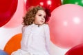 Portrait of teen girl in a hat and white dress on a background o Royalty Free Stock Photo