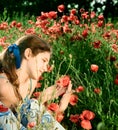 Portrait teen girl with poppy Royalty Free Stock Photo