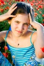 Portrait teen girl with poppy Royalty Free Stock Photo