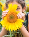 Portrait teen girl and sunflower Royalty Free Stock Photo