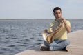 Portrait of teen musician playing instrument classic french horn Royalty Free Stock Photo