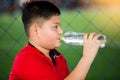 Portrait of teenage boy drinking water Royalty Free Stock Photo