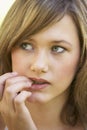 Portrait Of Teenage Girl Biting Nails Royalty Free Stock Photo