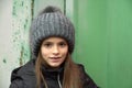 Girl with grey bobble hat
