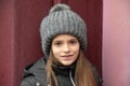 Girl with grey bobble hat