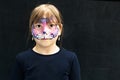 Portrait of a teenage girl with face painting in the form of a cat mask at a children`s party Royalty Free Stock Photo