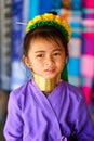 Portrait of a teenage girl from the Long Neck tribe with neck rings