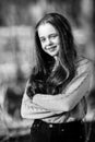 Portrait of a teenage girl outdoor. Black and white photo