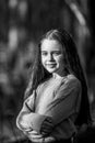 Portrait of a teenage girl outdoors. Black and white photo. Royalty Free Stock Photo