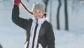 Portrait teenage girl with pigtailed wearing winter clothes in winter outside