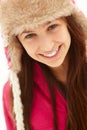 Portrait Of Teenage Girl In Snow Wearing Fur Hat Royalty Free Stock Photo