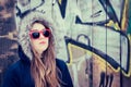 Portrait of a teenage girl wearing red sunglasses Royalty Free Stock Photo