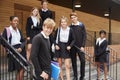 Portrait Of Teenage Students In Uniform Outside School Building Royalty Free Stock Photo