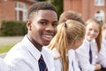 Portrait Of Teenage Students In Uniform Outside School Buildings Royalty Free Stock Photo