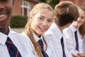 Portrait Of Teenage Students In Uniform Outside School Buildings Royalty Free Stock Photo