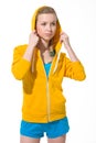 Portrait of teenager girl adjusting draped hood
