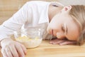 Portrait of Teenager Girl Sleeping on Table Surface Royalty Free Stock Photo