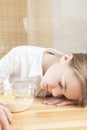 Portrait of Teenager Girl Sleeping on Table Surface Royalty Free Stock Photo