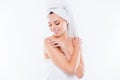 Portrait of tender sensual girl after shower with turban on head