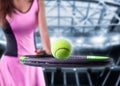 Portrait of a tennis player in a pink dress against the background of a sports arena. Olympic Games concept