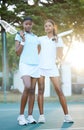 Portrait, tennis and teamwork with sports women standing on a court outdoor together ready for a game. Fitness