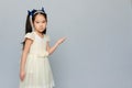Portrait of a thinking cute 6 years old Asian girl Royalty Free Stock Photo
