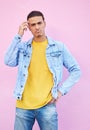 Portrait, thinking and man scratching his head confused, wondering and isolated in a studio pink background. Male, model