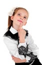 Portrait of thinking school girl child in uniform isolated Royalty Free Stock Photo