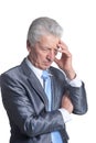 Portrait of thinking senior businessman on white background Royalty Free Stock Photo