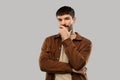 Portrait of thinking young man with mustaches Royalty Free Stock Photo