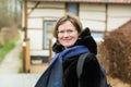 Portrait of a thirty year old beautiful woman with glasses at the Belgian countryside