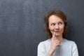 Portrait of thoughtful girl thinking and making choice Royalty Free Stock Photo