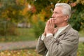 Portrait of a thoughtful senior man praying Royalty Free Stock Photo