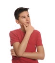 Portrait of thoughtful teenage boy on white background Royalty Free Stock Photo