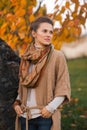 Portrait of thoughtful woman in beautiful evening autumn park Royalty Free Stock Photo