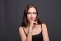 Portrait of thoughtful woman with mysterious look Royalty Free Stock Photo