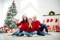 Portrait of three attractive lovely cheerful cheery glad excited careful family celebrating newyear loan purchase real Royalty Free Stock Photo