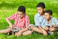 Portrait of three boys-brothers who sit together Royalty Free Stock Photo