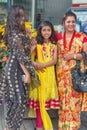 portrait of three brightly dressed beautiful indian women