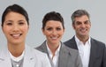 Portrait of three businesspeople smiling