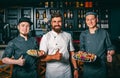 Portrait of three chefs in cafe Royalty Free Stock Photo