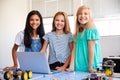 Portrait Of Three Female Students Building And Programing Robot Vehicle In School Computer Class Royalty Free Stock Photo