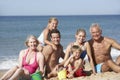 Portrait Of Three Generation Family On Beach Holiday Royalty Free Stock Photo