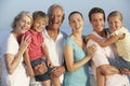 Portrait Of Three Generation Family On Beach Holiday Royalty Free Stock Photo