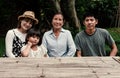 Portrait of three generations happy Asian family is sitting in the garden